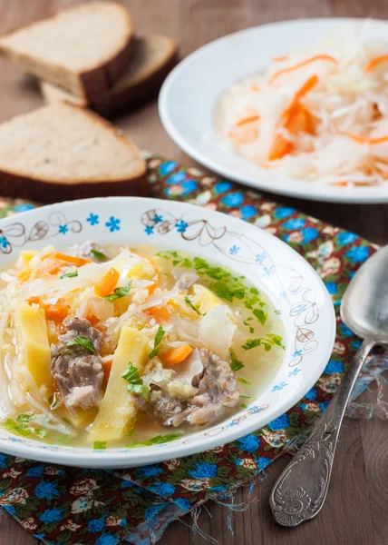 Sauerkraut soup with rye bread — Stock Image Sauerkraut soup with rye bread Royalty Free Stock Photos