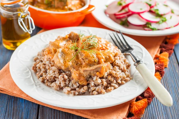 Meat, stewed in tomato sauce — Stock Photo, Image