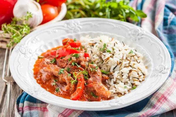 Beef stew with peppers and tomatoes — Stock Image Beef stew with peppers and tomatoes Royalty Free Stock Photos