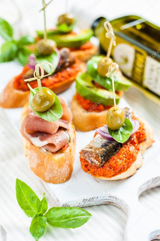 Spanish tapas pinchos with different fillings