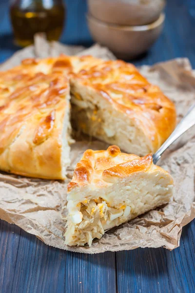 Yeast cake with filling - stewed cabbage with egg. — Stock Image Yeast cake with filling - stewed cabbage with egg. Stock Picture