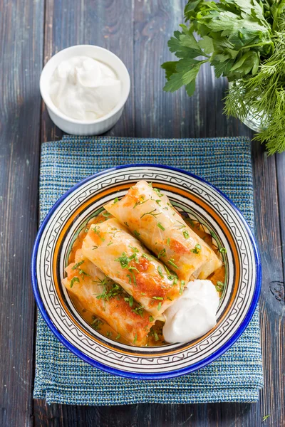 kelem dolmasi - Stuffed cabbage leaves.