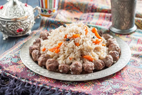 Pilaf or rice with meatballs — Stock fotografie