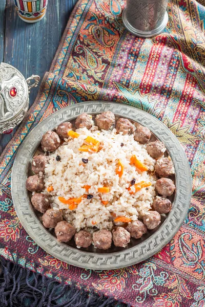 Pilaf or rice with meatballs — Stockfoto