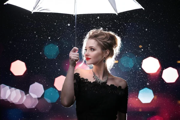 Beautiful woman with white umbrella