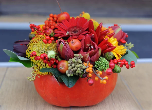 Autumn bouquet in a vase from pumpkin — Stock Photo, Image