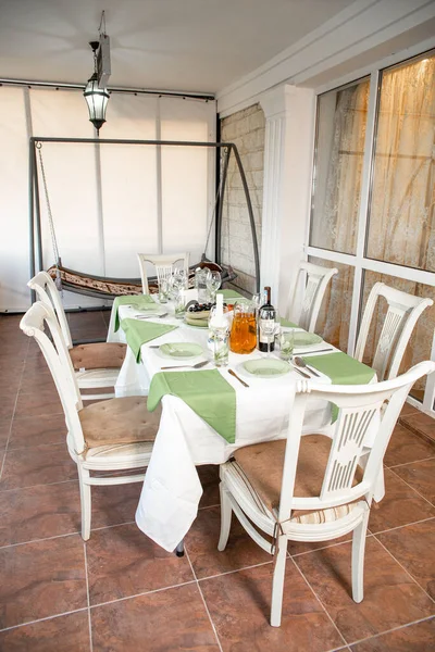 Recreation area on the balcony in a country house.