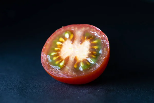 Red tomato slice isolated. Tomato