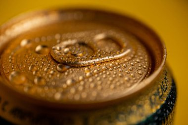cold metal soda can with condensation drops.