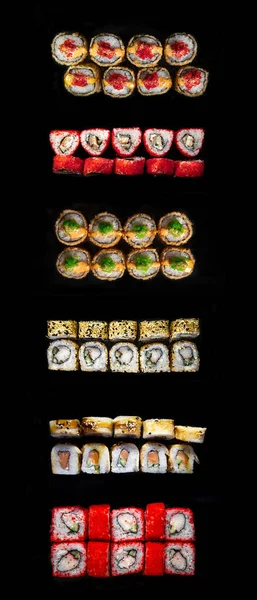 Een Set Van Broodjes Sushi Een Zwarte Achtergrond Soorten Sushi — Stockfoto