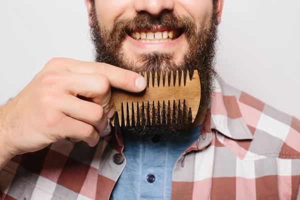 Handsome caucasian man close up with funny mustache comb beard and smile against white background — Stock Photo, Image