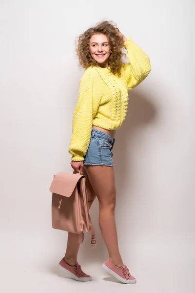 Beautiful girl look shoked posing with handbag — Stock Photo, Image