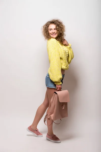 Beautiful girl look shoked posing with handbag — Stock Photo, Image