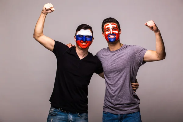 Russia vs Slovakia on grey background. Football fans of national teams celebrate, dance and scream. — Stock Photo, Image