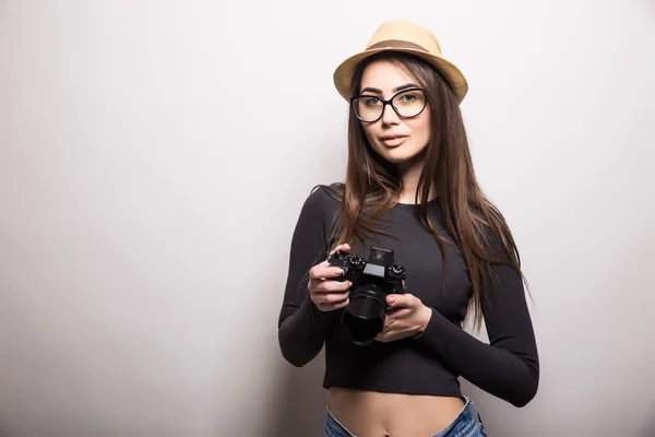 Cute tourist girl with photo camera — Stock Photo, Image
