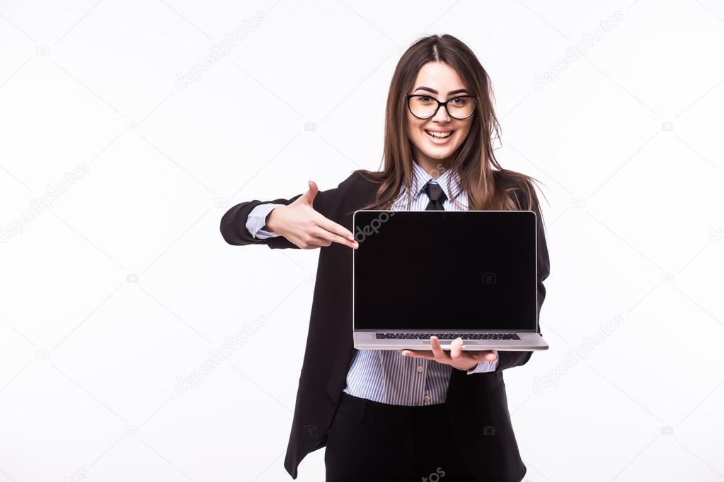 Smiling pretty young woman with friendly happy smile holding a laptop computer 