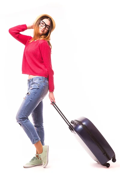 Mujer joven caminando con viajes — Foto de Stock