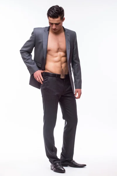 Mladý pohledný muž nosí oblek — Stock fotografie
