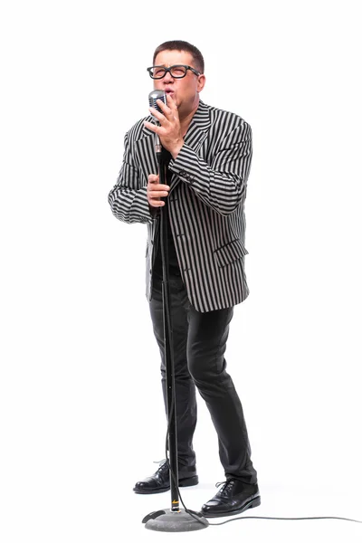 Showman concept. Singer listening music and sing in microphone — Stock Photo, Image