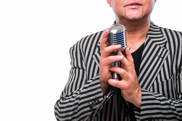 Showman concept. Singer listening music and sing in microphone — Stock Photo, Image