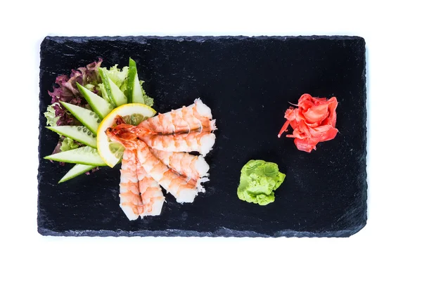 Sushi instellen en sushi rolt op zwarte stenen leisteen — Stockfoto
