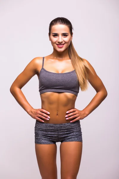 Mujer atleta demostrar el poder del cuerpo — Foto de Stock