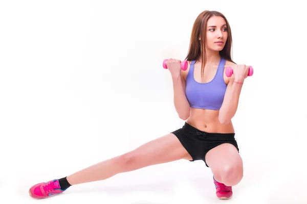 Aktiva sportive athletic kvinna med hantlar pumpa upp muskler biceps — Stockfoto