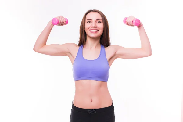 Mujer atlética deportiva activa con pesas bombeando músculos bíceps — Foto de Stock