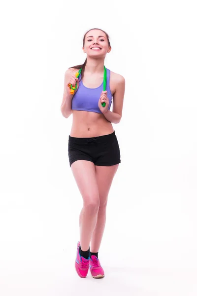 Kvinna med friska sportig figur med hopprep — Stockfoto