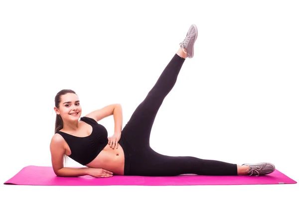 Slim fitness fiatal nő sportoló lány csinál gyakorlásának deszka — Stock Fotó