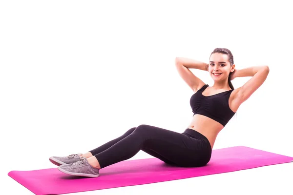 Slim fitness mujer joven atleta chica haciendo ejercicio tablón — Foto de Stock