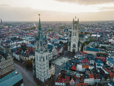 Drone flight revealing Ghents gothic towers and architectural landmarks.