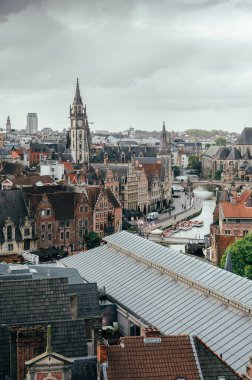 Scenic outlook from the Gravensteen fortress capturing Ghent towers rising above rooftops.