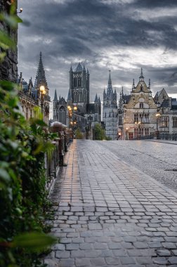 Ghent, Belgium - October 5, 2025 - Scenic canal view framed by Belgian-style architecture in Ghents old district.