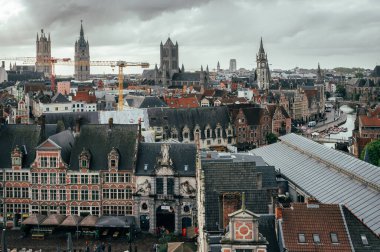 Ghent, Belgium - October 5, 2025 - High view from the fortress of Gravensteen revealing the rooftops and towers of old Ghent.