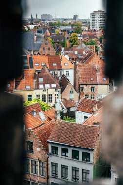 Ghent, Belgium - October 5, 2025 - Drone footage showing Ghents historic center with towers, canals, and traditional Belgian architecture.