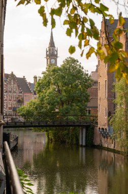 The canal in Ghent center, surrounded by elegant old architecture.