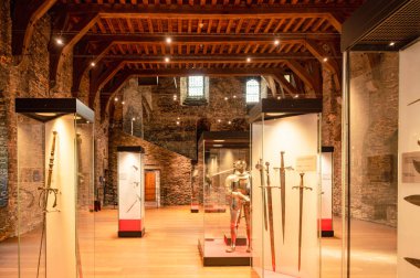 Ghent, Belgium - October 5 2025: Medieval interior of Gravensteen Castle in Ghent, Belgium, featuring stone walls, arched windows, and historical atmosphere from the Middle Ages.