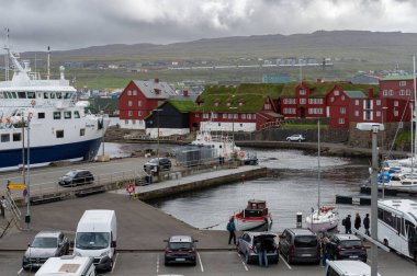 Torshawn city, the capital of The Faroe Islands, Denmark. Vestaravag harbor in Torshavn with its boats and colorful buildings. High quality photo
