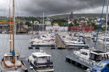Torshawn city, the capital of The Faroe Islands, Denmark. Vestaravag harbor in Torshavn with its boats and colorful buildings. High quality photo
