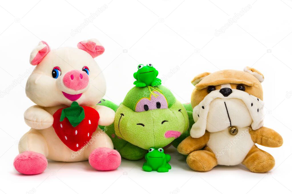 Children's soft toys on a white background