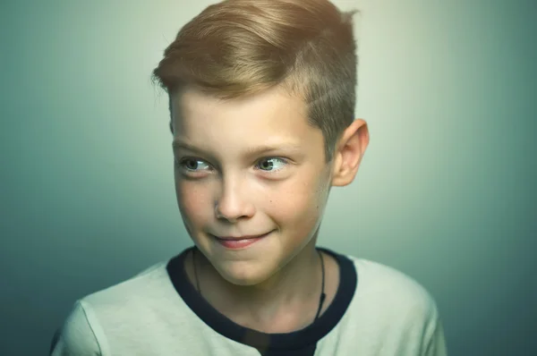 Teenage boy with stylish haircut and bright eyes — Stock Photo, Image