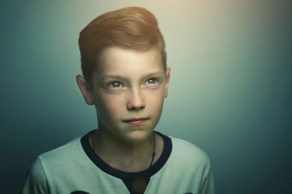 Teenage boy with stylish haircut and bright eyes — Stock Photo, Image