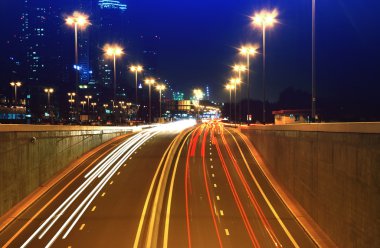 Night highway in big city clipart