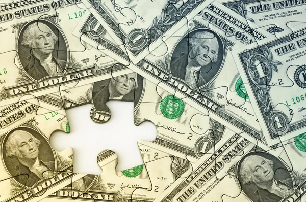 Dollar-Banknoten mit Puzzle-Effekt. — Stockfoto