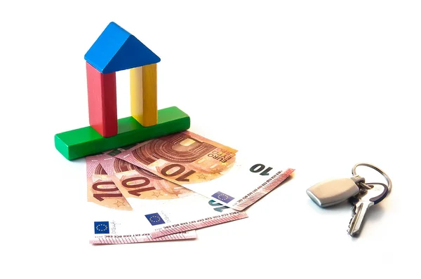 Geld investeringen huissleutel — Stockfoto