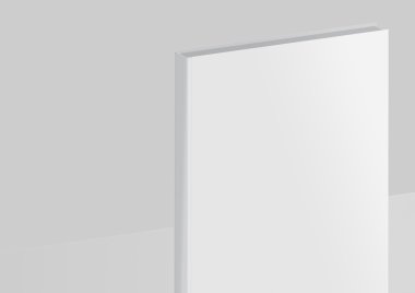 Gri bir arka plan üzerinde izole mock-up kitap.