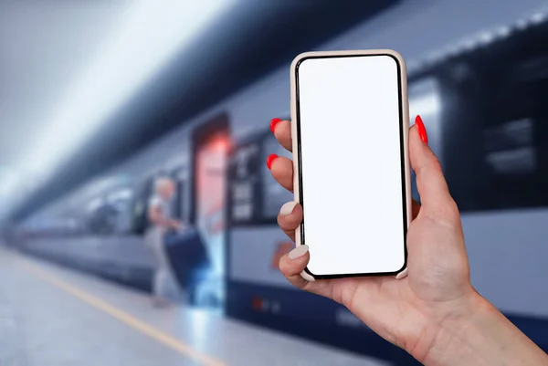 Mockup of a smartphone with a white screen close-up against the background of the train in the subway