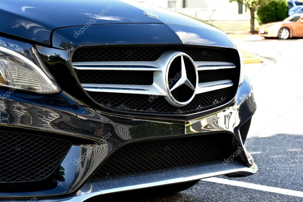 MARYLAND, USA - MAY 7, 2016: A black Mercedes Benz C400. Mercedes Benz is a luxury car dealer and manufacturer.