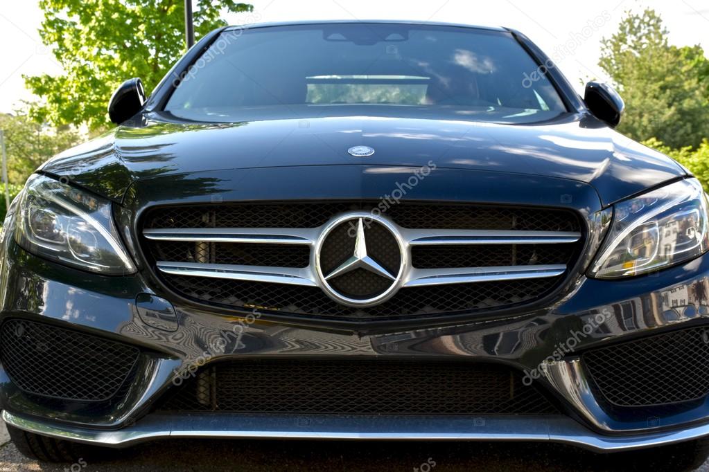 MARYLAND, USA - MAY 7, 2016: A black Mercedes Benz C400. Mercedes Benz is a luxury car dealer and manufacturer.
